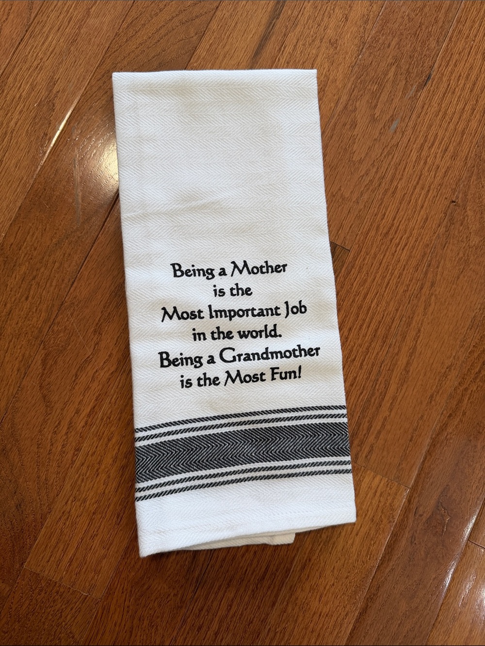 White Tea Towel with 'Being a Mother' Quote - Black Stripe
